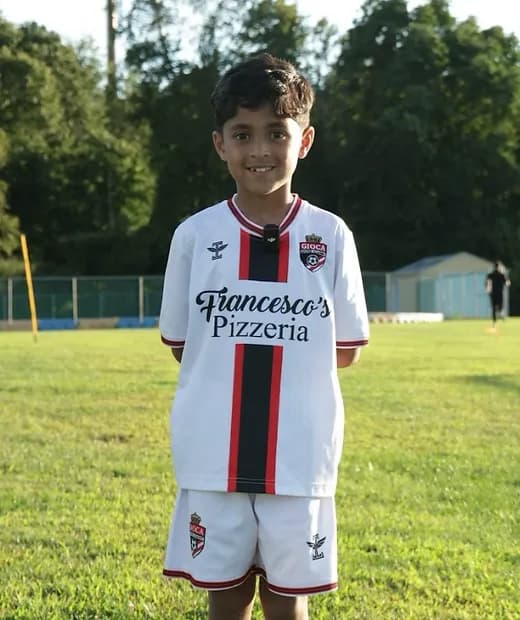 A young player working through a purposeful training exercise